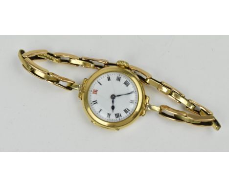 An early English Rotherhams ladies 18ct gold wristwatch, circa 1924, retailed by Lloyd Payne &amp; Amiel Manchester, having a