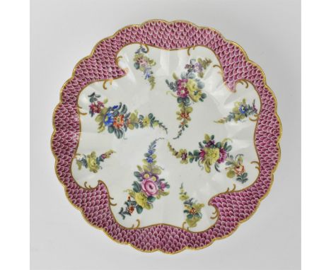 An 18th century Worcester porcelain dish from the Mr and Mrs D.H. Sidders Collection, Worcester, with petal border and gilt r