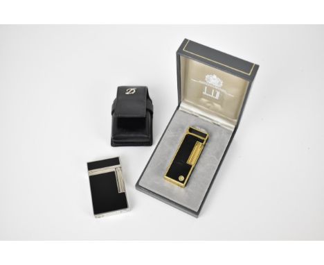 An Art Deco style black and chrome Dupont lighter with original leather pouch, together with a black laquered and gilt Dunhil