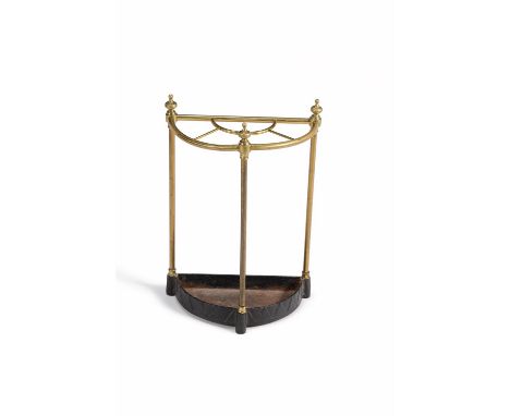 A Victorian brass and cast iron stick stand, circa 1890, of bowfront outline, 61cm high, 41cm wide, 21cm deep 