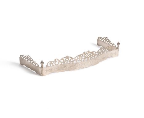 An early George III engraved steel fender, circa 1760, of adjustable design,  the pierced 'fretwork' decoration depicting scr