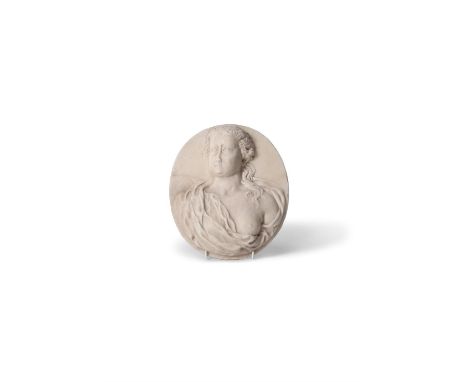 A Northern European or English sculpted white marble portrait relief of a maiden, early 18th century, of oval form, the sitte