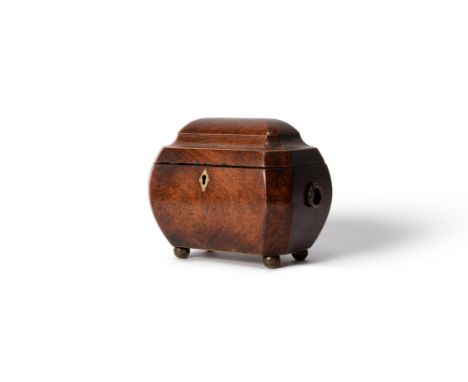 Y A late George III walnut, rosewood, sycamore strung and bone and metal mounted tea caddy, circa 1810, the bombe sarcophagus