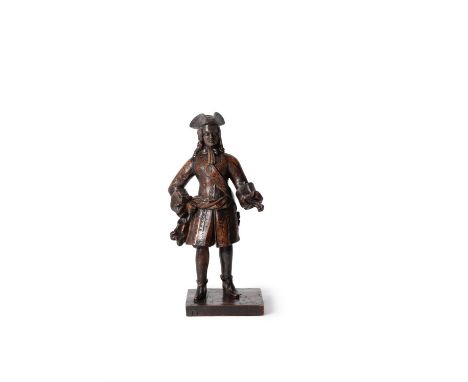A rare sculpted oak model of a European merchant or army officer, first quarter 18th century, Dutch or possibly French, in co