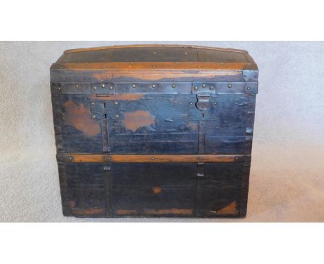 A vintage domed top cabin trunk with twin carrying handles. H.60 W.71 D.46cm 