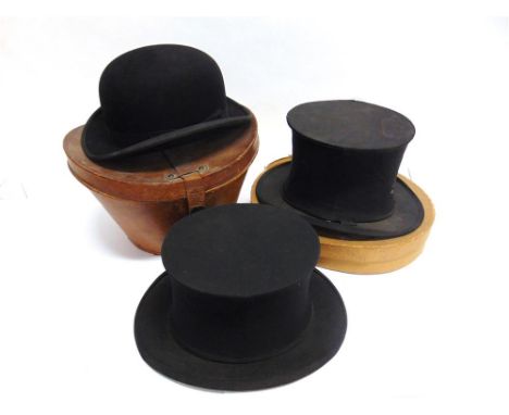 A COLLAPSIBLE GENT'S BLACK SILK TOP HAT size 6 1/2, by 'Flights Ltd, 4 New Burlington Street, London W'; and another, size 6 