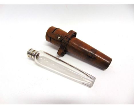 A CONICAL GLASS FLASK with plated mount in a leather holder for saddle mounting, length of holder 22.5cm
