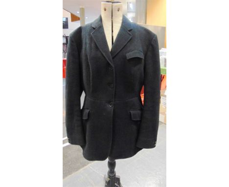 A LADY'S BLACK WOOL HUNTING COAT by Harry Hall, size 42