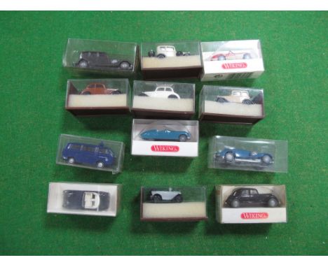 Twelve Boxed "HO" Scale Plastic Lineside Vehicles by Wiking, Brekina, including Wiking #8160523 Austin Healey 3000. 