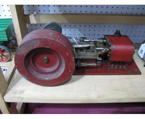 A Large Model of A Horizontal Single Cylinder Steam Engine, heavy cast flywheel 13½cm diameter, 34cm long, in need of some re