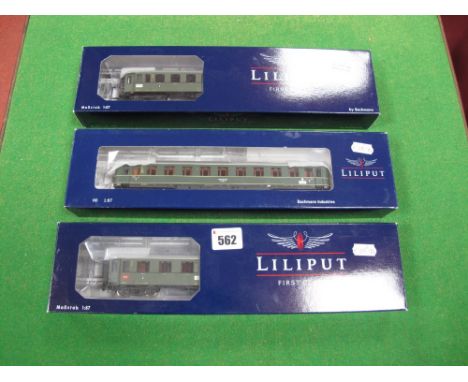 Three Boxed Liliput "HO" Scale Outline German 'DRG' Eight Wheeled Coaches, including #L384713 3rd Class Coach, #L384603 1st/2