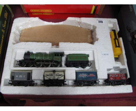 A Hornby "00" Gauge Class B12 4-6-0 Locomotive and Tender, R/no 8509, L.N.E.R green, plus five rolling stock wagons, vans, et