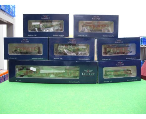 Seven Liliput HO Scale DR Freight Wagons, in camouflage livery, boxed, includes #L336615 Flak Wagen with Machine Guns.