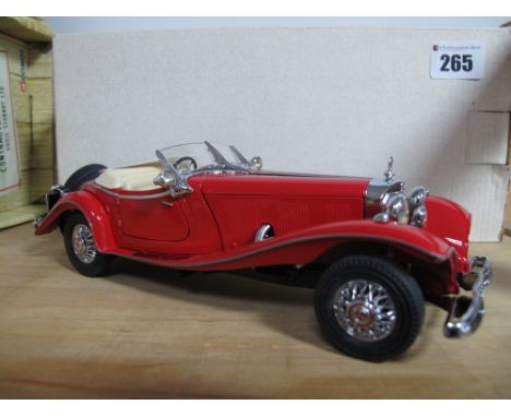 A Franklin Mint 1:24th Scale Diecast Model Mercedes-Benz 500K Special Roadster, literature present, boxed.