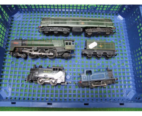 Four OO Scale Model Railway Locomotives by Tri-ang - Britannia, Class 31 and two tank locos, well playworn. 