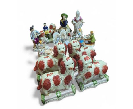 Collection of ceramic figurines including reproduction Staffordshire dogs