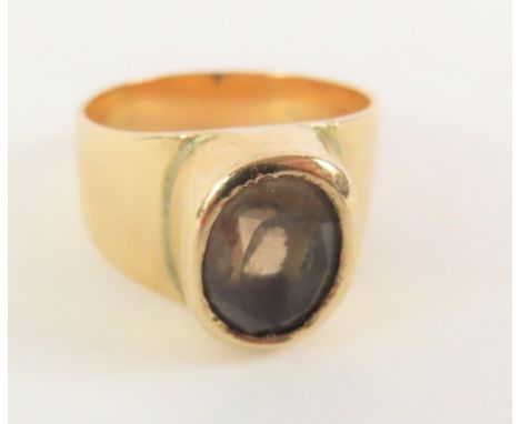 A chunky smoky quartz dress ring, the mount marked '9ct', finger size L 1/2 centre, 5.1g gross