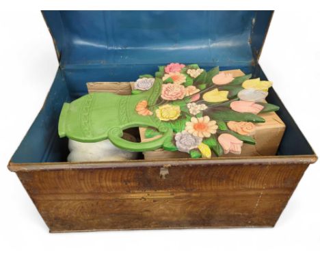 A painted metal domed trunk and contents