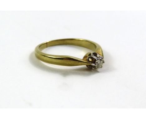 A diamond solitaire ring, marked '585', finger size L, 2.7g gross