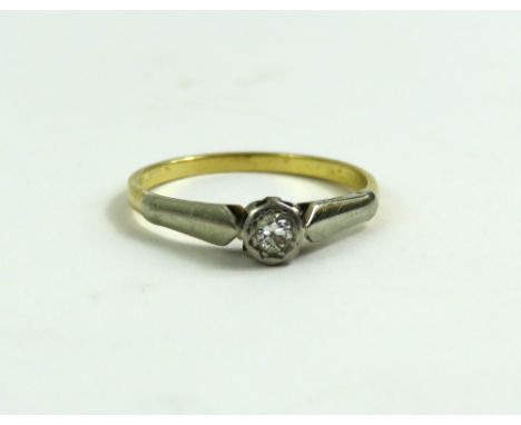 A single stone illusion set diamond ring, finger size P, tests as 18-22ct gold, 2.2g gross