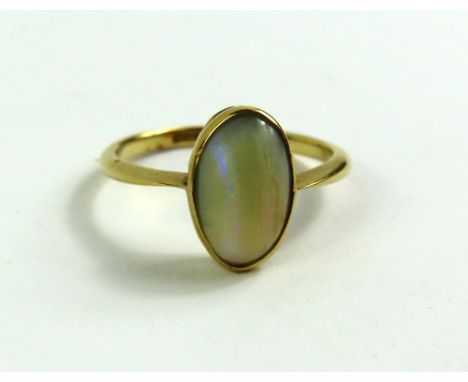 An opal single stone ring, marked '18ct', finger size N 1/2, 2.3g gross