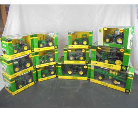 12 Boxed 1/32 Britains John Deere diecast tractor models to include 956ORT, 5430i Self Propelled Sprayer, 3640, 7260R, 3050, 