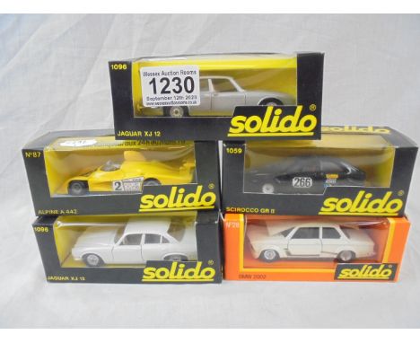 Five boxed Solido diecast models, all ex-shop stock, to include 2 x 1096 Jaguar XJ12 (in white &amp; silver), 1059 Scirocco G