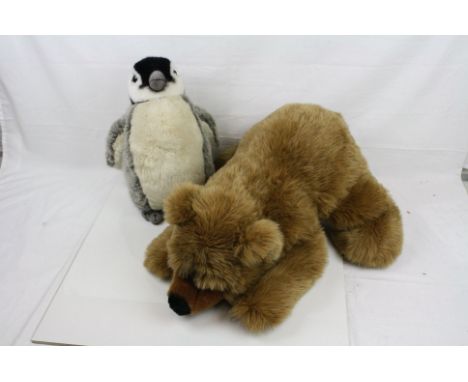 Two contemporary Steiff soft toy animals to include Penguin (15" approx) and crouching bear (25" approx) in good condition