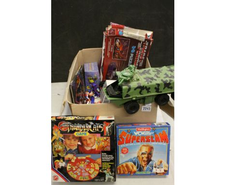 Quantity of 80s/90s toys to include WCW Wrestling ring, American Gladiators figures, Action Force vehicle, 2 x boxed Transfor