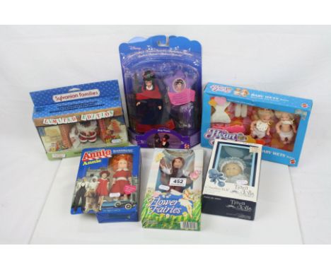 Ex shop stock - Six boxed dolls and figures to include Mattel Disney Mary Poppins, Knickebocker Annie, Tomy Sylvanian Familie