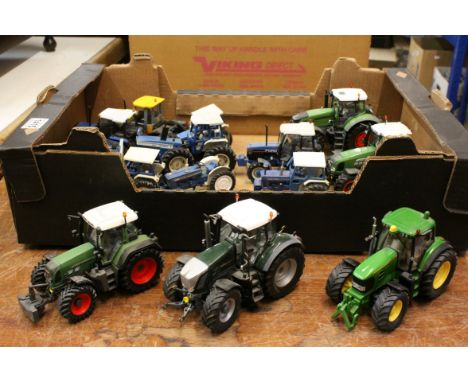 14 loose diecast tractor models, to include Britains, Wiking, Siku etc