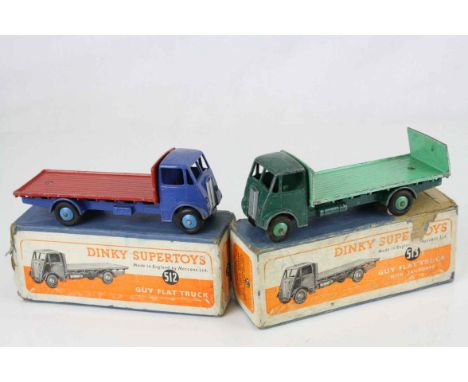 Two boxed Dinky Supertoys to include 512 Guy Flat Truck (blue cab and chassis, red flatbed, light blue cabs) and 513 Guy Flat