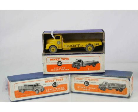 Three boxed Dinky Supertoys to include 532 Comet Wagon with hinged tailboard (green cab and chassis, orange trailer, cream hu