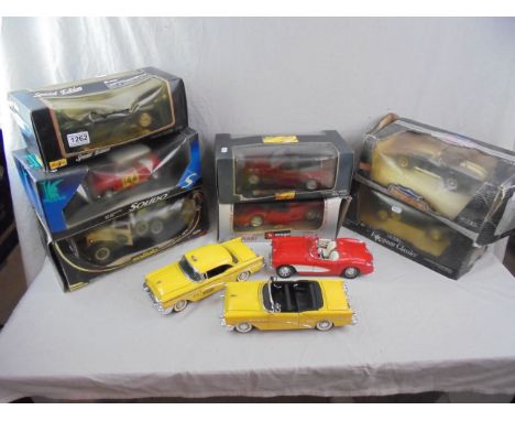 Seven boxed 1/18 scale diecast models to include Solido x 2, ERTL European Classics, Burago, Maisto x 2 and ERTL American Mus