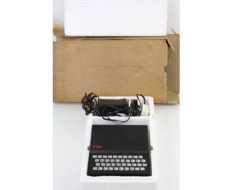 Retro Gaming - Sinclair ZX81 console with packaging and instructions 