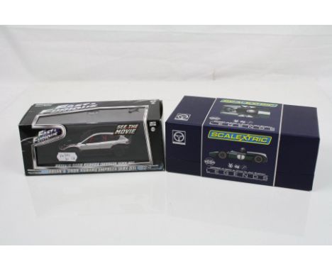 Two boxed / cased slot cars to include Scalextric Legends ltd edn of 3000 C3658a Cooper Climax J Brabham and Green Light 8622