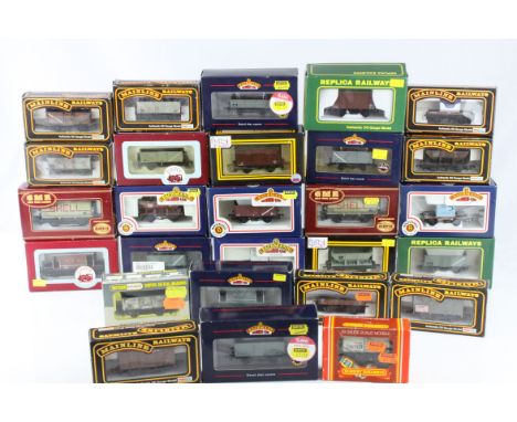 27 Boxed OO gauge items of rolling stock, all trucks and wagons to include Bachmann x 9, Replica Railways x 2, Wrenn x 1, Mai