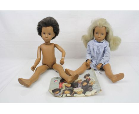 Two original Sasha dolls to include girl with original dress and boy (no outfit), good condition although a little grubby 