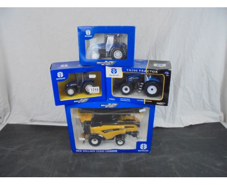 Four boxed Britains / Britains ERTL New Holland diecast farming models to include 13683 TG305 Tractor, 9973852 (40449) CX880 