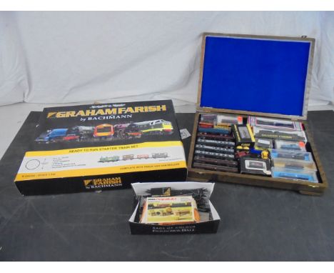 Collection of N gauge model railway to include 19 x items of rolling stock (5 boxed  cased), Grafar Raveningham Hall locomoti