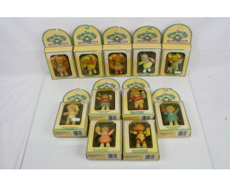 11 Boxed [anosh Place Cabbage Patch Kids Poseable Figures, all variants, unopened 