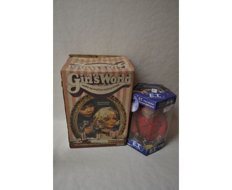 Two mixed vintage toys including Girls world make-up and hair styling model by palitoy and e.t the extra terrestrial by hasbr