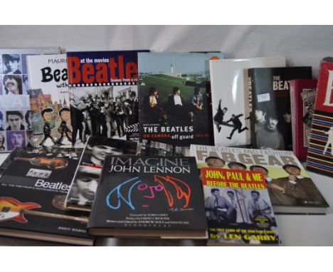 The Beatles - fifteen hard back books including Beatles Gear, On Camera Off Guard (signed by the author Hunter Davies), Mojo,