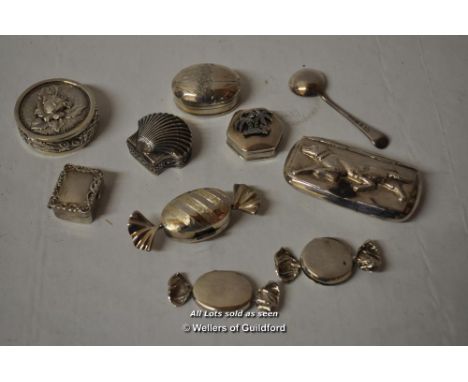 Small silver pill boxes including examples modelled as sweets, a shell; snuff box with labrador dog design, approx 100g.