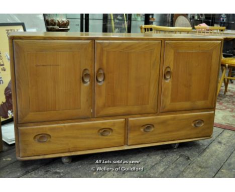 *An Ercol sideboard, 129cm wide.