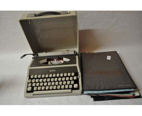 vintage cased litton royal 200 typewriter with associated accessories