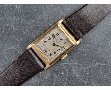 An Art Deco Aero 'Tank' 9ct gold manual wind wristwatch, 23mm x 30mm, Case ref. 99768, on later brown leather strap.