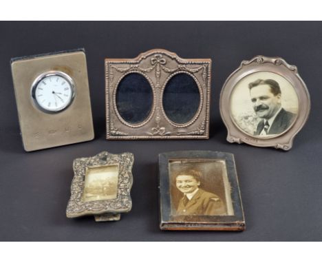 A silver mounted double photograph frame, by&nbsp;Ray Hall, Birmingham 1991, 12 cm wide; together with three other silver mou