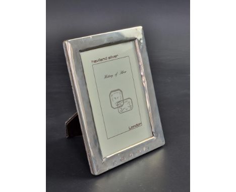 A silver mounted easel photograph frame, by&nbsp;A Haviland-Nye, London, 18.5cm high.