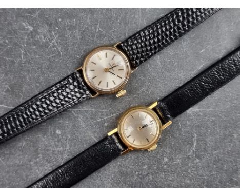 A vintage Omega 18ct gold manual wind ladies wristwatch;&nbsp;together with a similar 9ct gold example, with Omega box. (2)